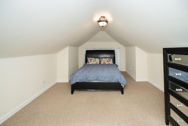 2440 Oak Park Ave, Berwyn, IL 60402 - bedroom with carpet floors, baseboards, and vaulted ceiling