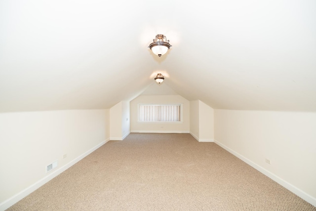 2440 Oak Park Ave, Berwyn, IL 60402 - bonus room with light colored carpet, baseboards, and vaulted ceiling