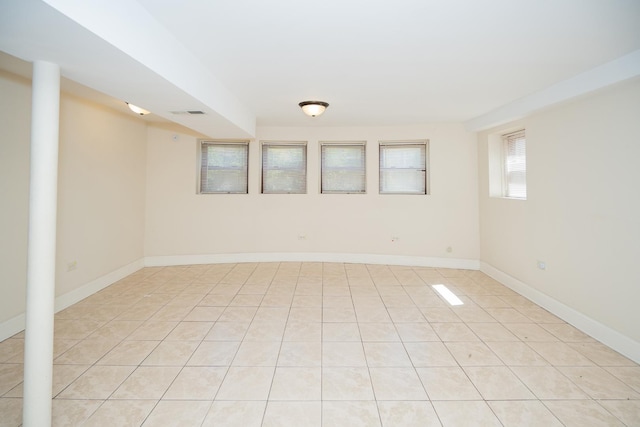 2440 Oak Park Ave, Berwyn, IL 60402 - unfurnished room with light tile patterned flooring and baseboards