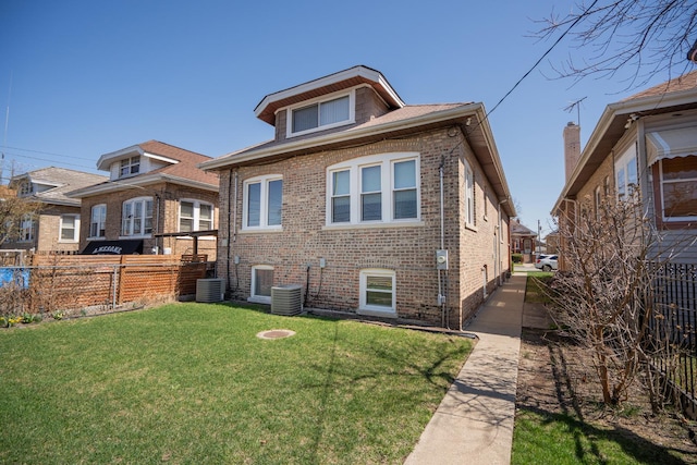 2440 Oak Park Ave, Berwyn, IL 60402 - rear view of house featuring brick siding and central AC unit