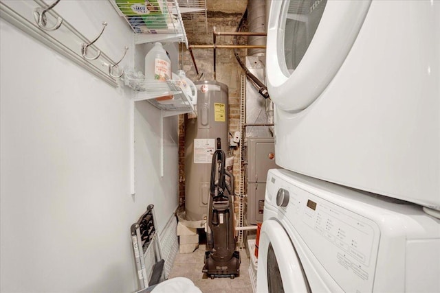 616 W Fulton St Unit 212, Chicago, IL 60661 - laundry room featuring estacked washer and dryer and water heater