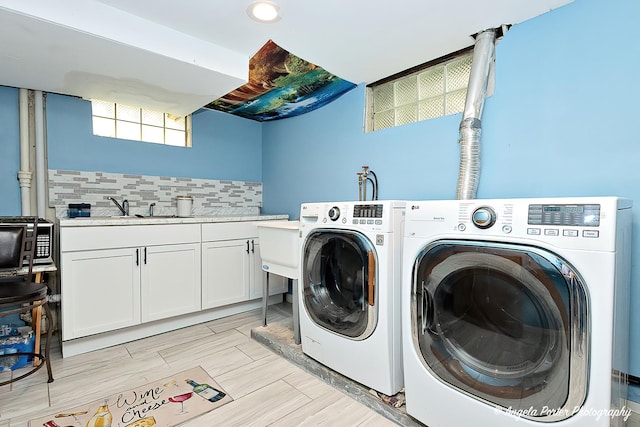 617 Colville Pl, Waukegan, IL 60087 - washroom featuring a sink and washer and dryer