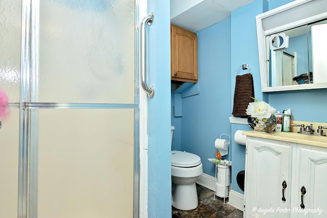 617 Colville Pl, Waukegan, IL 60087 - full bath featuring a shower stall, vanity, toilet, and baseboards
