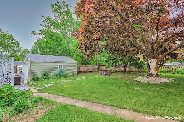 617 Colville Pl, Waukegan, IL 60087 - view of yard featuring an outdoor structure and an outdoor fire pit