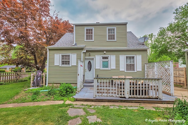 617 Colville Pl, Waukegan, IL 60087 - view of front of property featuring a wooden deck and a shingled roof