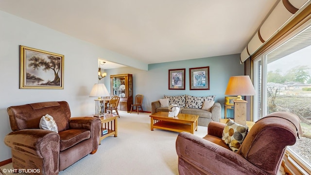 16101 Wabash Ave, South Holland, IL 60473 - living room with carpet flooring, a chandelier, and baseboards