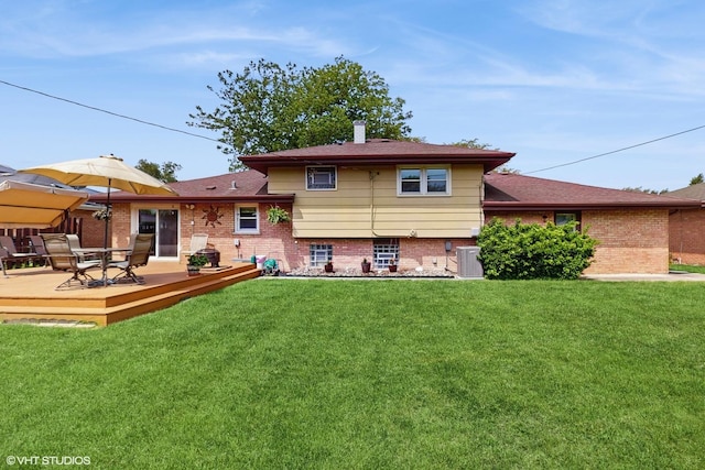 16101 Wabash Ave, South Holland, IL 60473 - rear view of property with brick siding, a deck, a yard, and central air condition unit