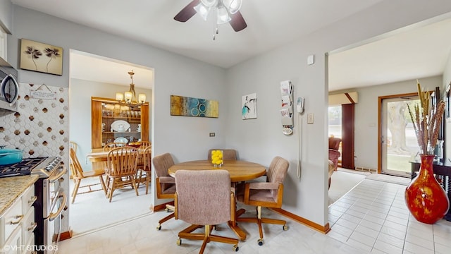 16101 Wabash Ave, South Holland, IL 60473 - dining room with a ceiling fan, a chandelier, and baseboards