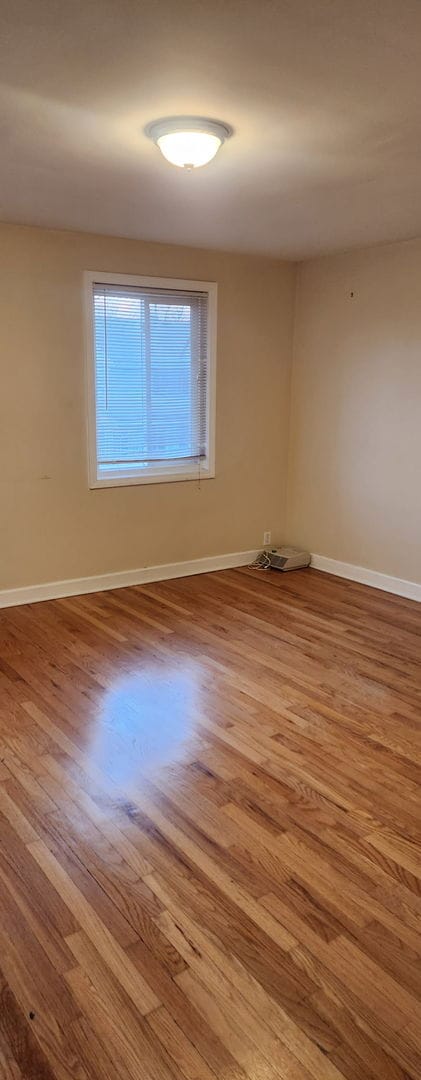3538 Western Ave Unit 0, Park Forest, IL 60466 - spare room with wood finished floors