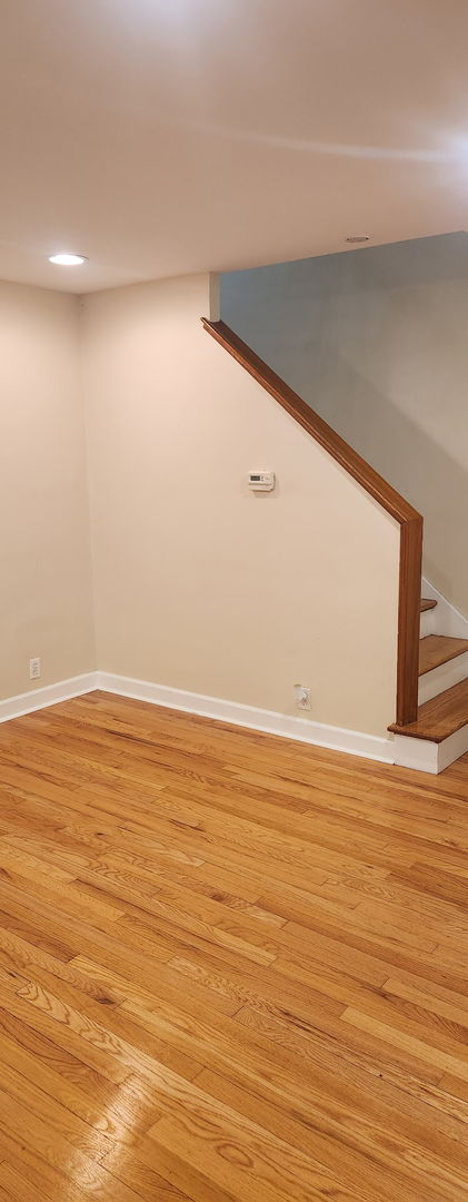 3538 Western Ave Unit 0, Park Forest, IL 60466 - below grade area with light wood-style flooring and stairway