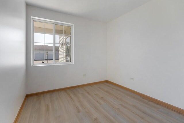 1505 Silverstone Dr Unit 1505, Carpentersville, IL 60110 - empty room with light wood-type flooring and baseboards