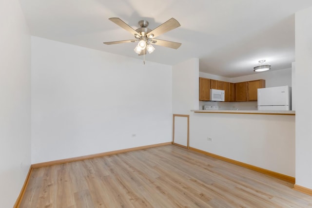 1505 Silverstone Dr Unit 1505, Carpentersville, IL 60110 - unfurnished living room with light wood-style flooring, baseboards, and ceiling fan