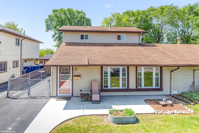 4037 W 90th Pl, Hometown, IL 60456 - rear view of property featuring roof with shingles, a gate, and a patio area