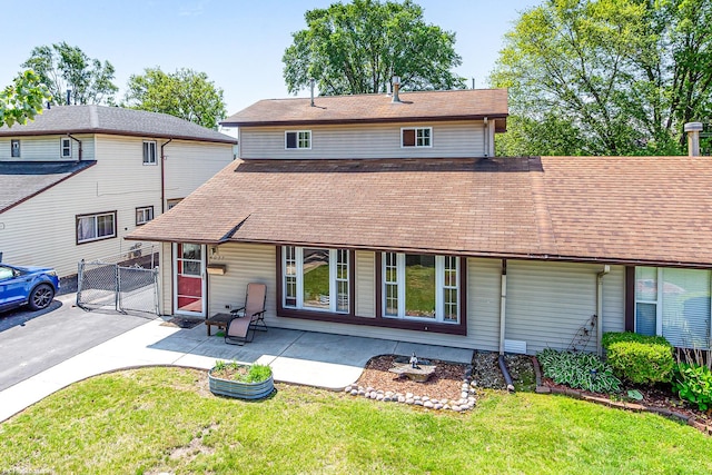 4037 W 90th Pl, Hometown, IL 60456 - rear view of property featuring roof with shingles, a gate, and a patio