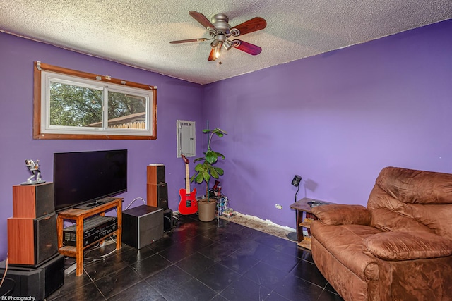 4037 W 90th Pl, Hometown, IL 60456 - sitting room with a ceiling fan, electric panel, a textured ceiling, and baseboards
