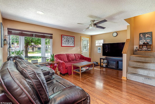 4037 W 90th Pl, Hometown, IL 60456 - living room with a ceiling fan, a textured ceiling, wood finished floors, and stairs