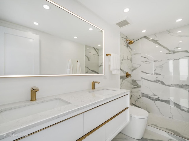 111 E Chestnut St Unit 40C, Chicago, IL 60611 - bathroom with recessed lighting, marble finish flooring, double vanity, and a marble finish shower