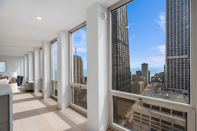 111 E Chestnut St Unit 40C, Chicago, IL 60611 - sunroom featuring a water view, a city view, and recessed lighting