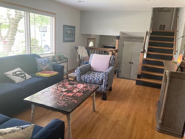 111 Magnolia Ln, Lindenhurst, IL 60046 - living area featuring light wood-style floors and stairs