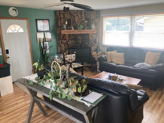 111 Magnolia Ln, Lindenhurst, IL 60046 - living area featuring a ceiling fan and wood finished floors
