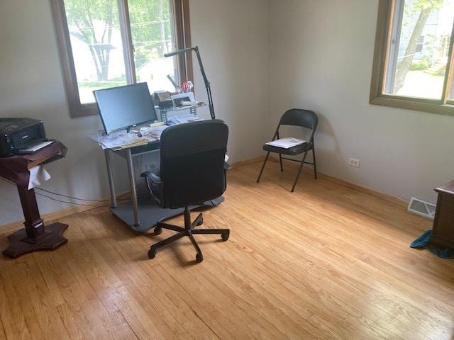111 Magnolia Ln, Lindenhurst, IL 60046 - home office with light wood-type flooring and baseboards