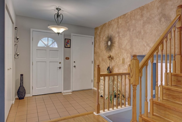 833 Summerfield Dr, Roselle, IL 60172 - foyer featuring baseboards, stairs, and light wood-style flooring