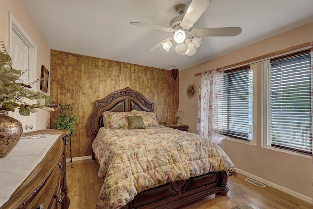 833 Summerfield Dr, Roselle, IL 60172 - bedroom featuring baseboards, light wood-style flooring, and a ceiling fan