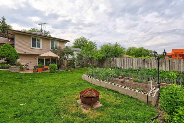 833 Summerfield Dr, Roselle, IL 60172 - view of yard with a garden, an outdoor fire pit, and a patio area