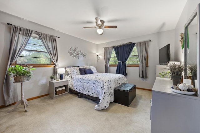 931 Sunset Rd, Wheaton, IL 60189 - bedroom featuring baseboards, light carpet, multiple windows, and a ceiling fan