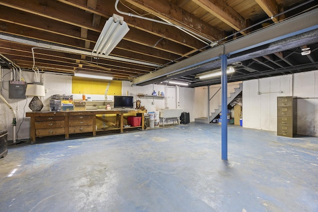 931 Sunset Rd, Wheaton, IL 60189 - basement with stairs and a workshop area