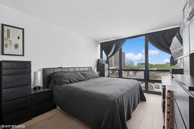 1636 N Wells St Unit 615, Chicago, IL 60614 - bedroom featuring light wood-style floors