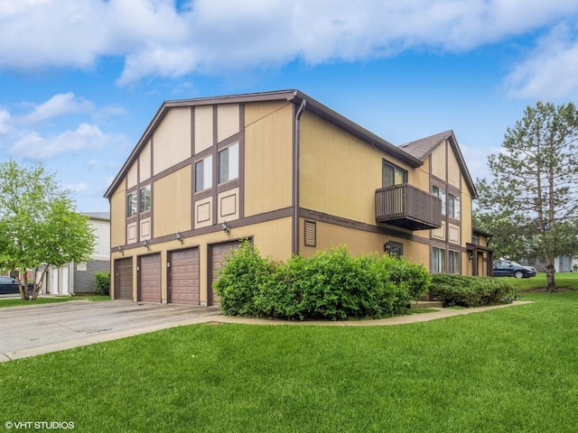1292 Inverrary Ln Unit 7D, Palatine, IL 60074 - view of property exterior featuring a garage, driveway, and a yard