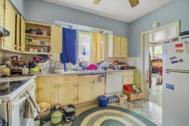 623 Dekalb Ave, Dekalb, IL 60115 - kitchen with white appliances, backsplash, light countertops, open shelves, and a ceiling fan