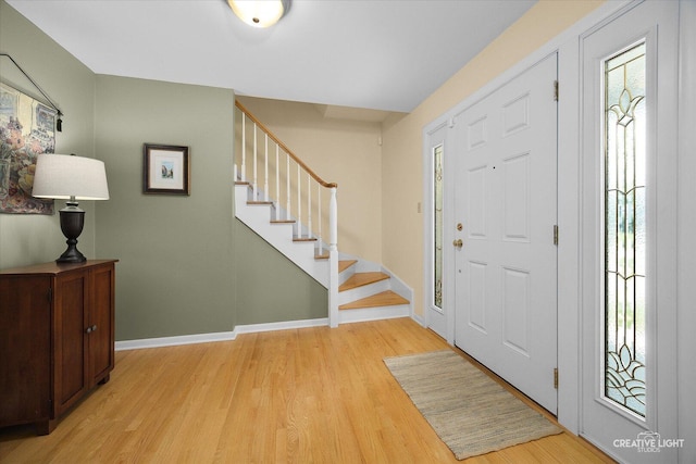 1903 Brentwood Ln, Wheaton, IL 60189 - entryway with light wood-style flooring and stairs