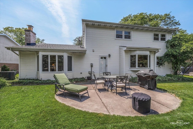 1903 Brentwood Ln, Wheaton, IL 60189 - back of house featuring a patio area, a yard, and a chimney