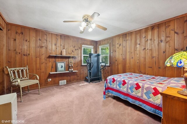 359 N Shady Ln, Elmhurst, IL 60126 - bedroom featuring carpet, wooden walls, and ceiling fan