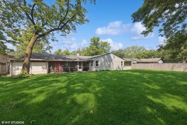 359 N Shady Ln, Elmhurst, IL 60126 - rear view of house featuring a sunroom and an attached garage