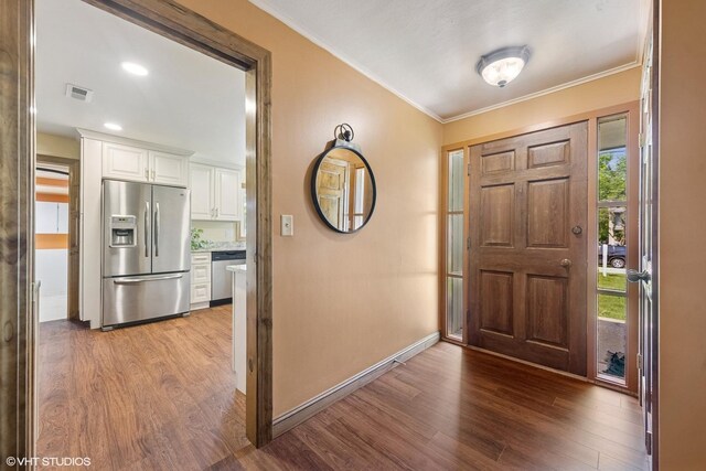 359 N Shady Ln, Elmhurst, IL 60126 - foyer entrance featuring wood finished floors, crown molding, and baseboards