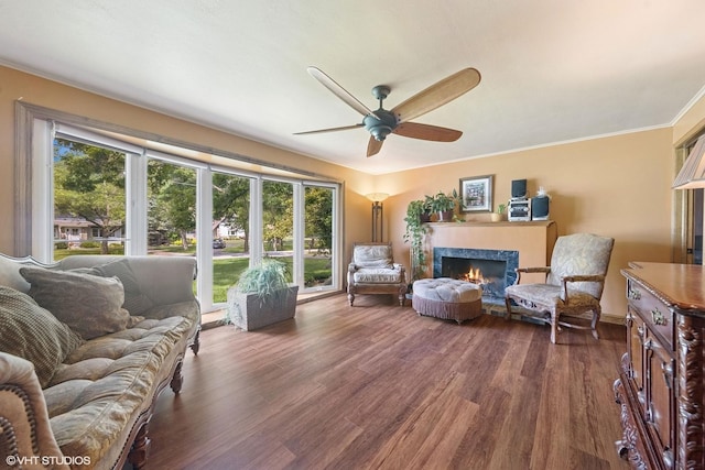 359 N Shady Ln, Elmhurst, IL 60126 - living room with ceiling fan, dark wood-type flooring, a tile fireplace, and crown molding