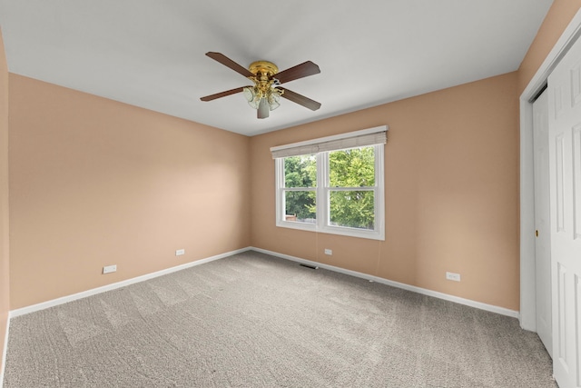 926 Navajo St, Carol Stream, IL 60188 - unfurnished bedroom featuring a closet, carpet, and a ceiling fan