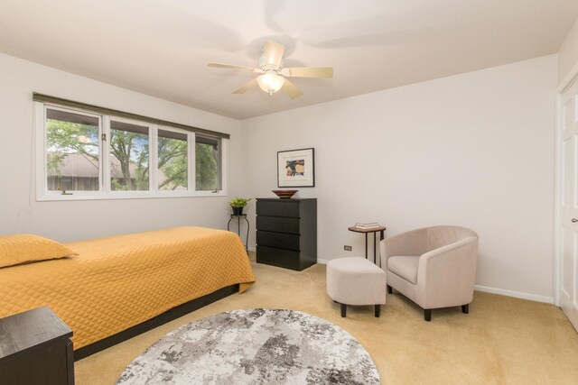 1023 Rene Ct, Park Ridge, IL 60068 - bedroom with light carpet, baseboards, and a ceiling fan