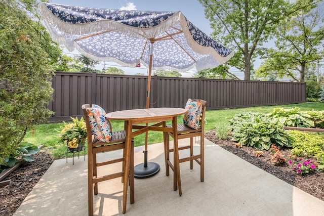 1023 Rene Ct, Park Ridge, IL 60068 - fenced backyard featuring a patio area and outdoor dining space