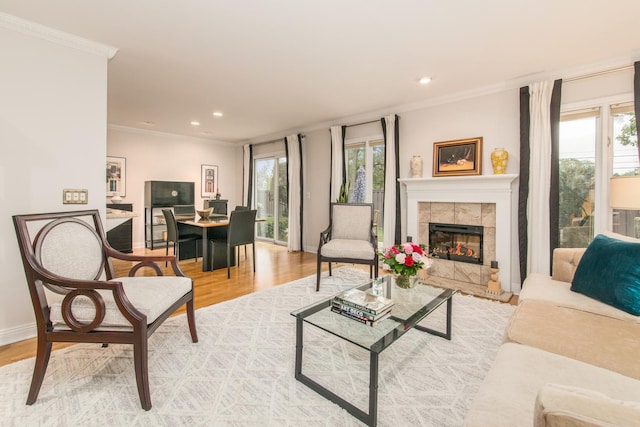 1023 Rene Ct, Park Ridge, IL 60068 - living area featuring crown molding, light wood finished floors, a tiled fireplace, baseboards, and recessed lighting
