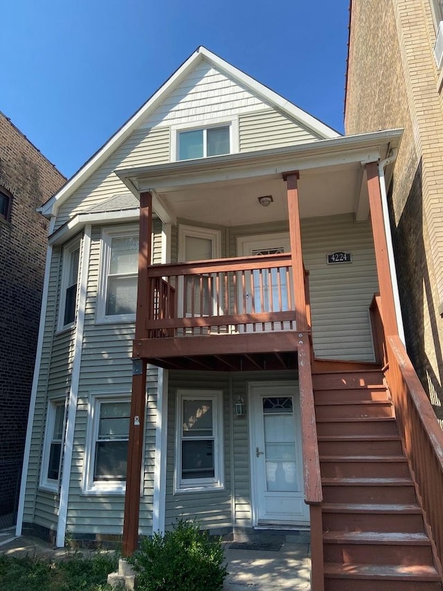 4224 N Kimball Ave, Chicago, IL 60618 - view of front facade with a balcony