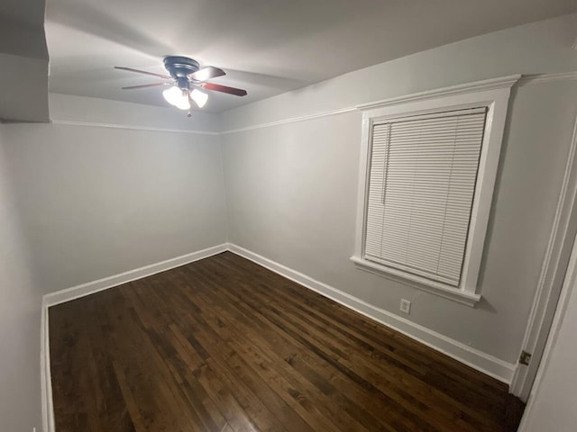 4224 N Kimball Ave, Chicago, IL 60618 - spare room featuring ceiling fan, dark wood-style flooring, and baseboards