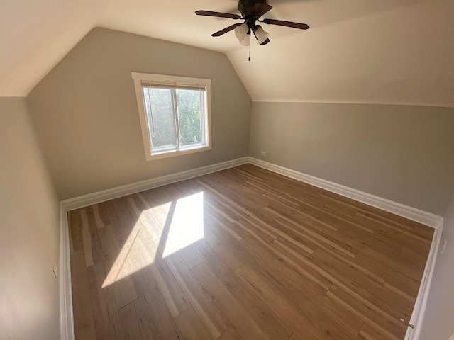 4224 N Kimball Ave, Chicago, IL 60618 - additional living space with wood finished floors, a ceiling fan, baseboards, and vaulted ceiling