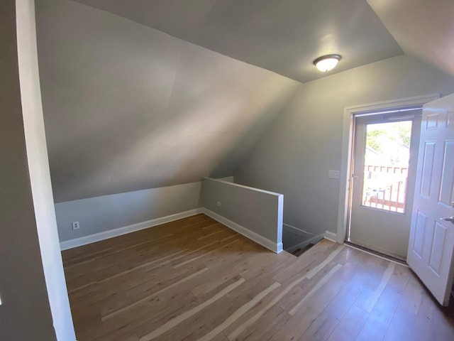 4224 N Kimball Ave, Chicago, IL 60618 - additional living space with vaulted ceiling, wood finished floors, and baseboards