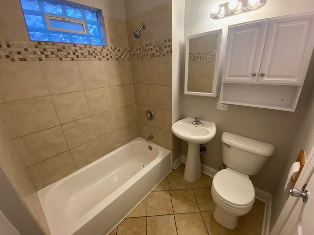 4224 N Kimball Ave, Chicago, IL 60618 - bathroom with toilet, shower / tub combination, tile patterned floors, and baseboards
