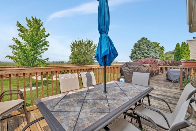 2825 Centurion Ln, New Lenox, IL 60451 - wooden terrace with outdoor dining area and a lawn