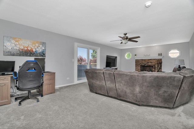 2825 Centurion Ln, New Lenox, IL 60451 - living room with a ceiling fan, light carpet, a fireplace, baseboards, and a desk